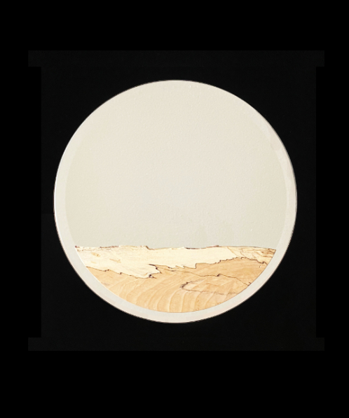 A mirror overlaid with spalted maple
